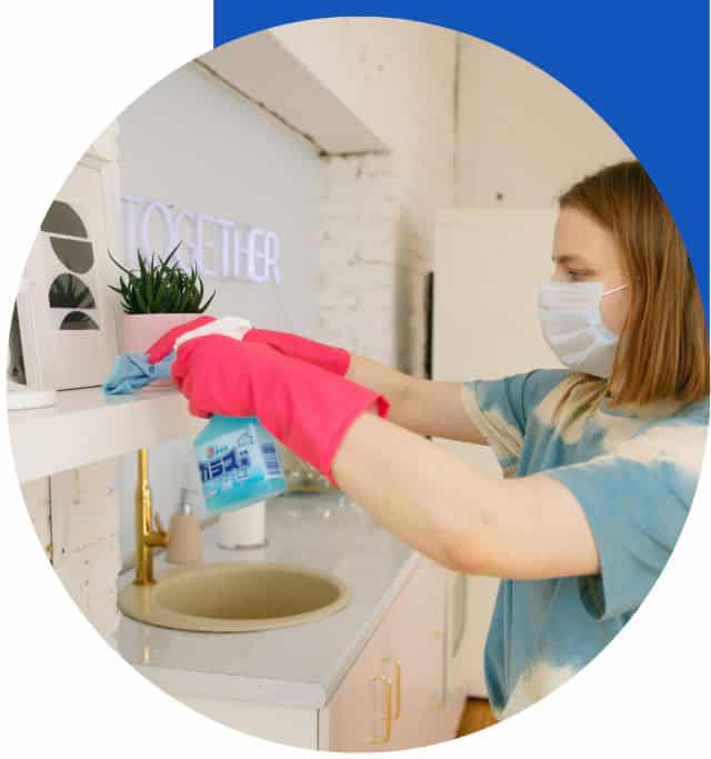 Cleaning women cleaning office bathroom